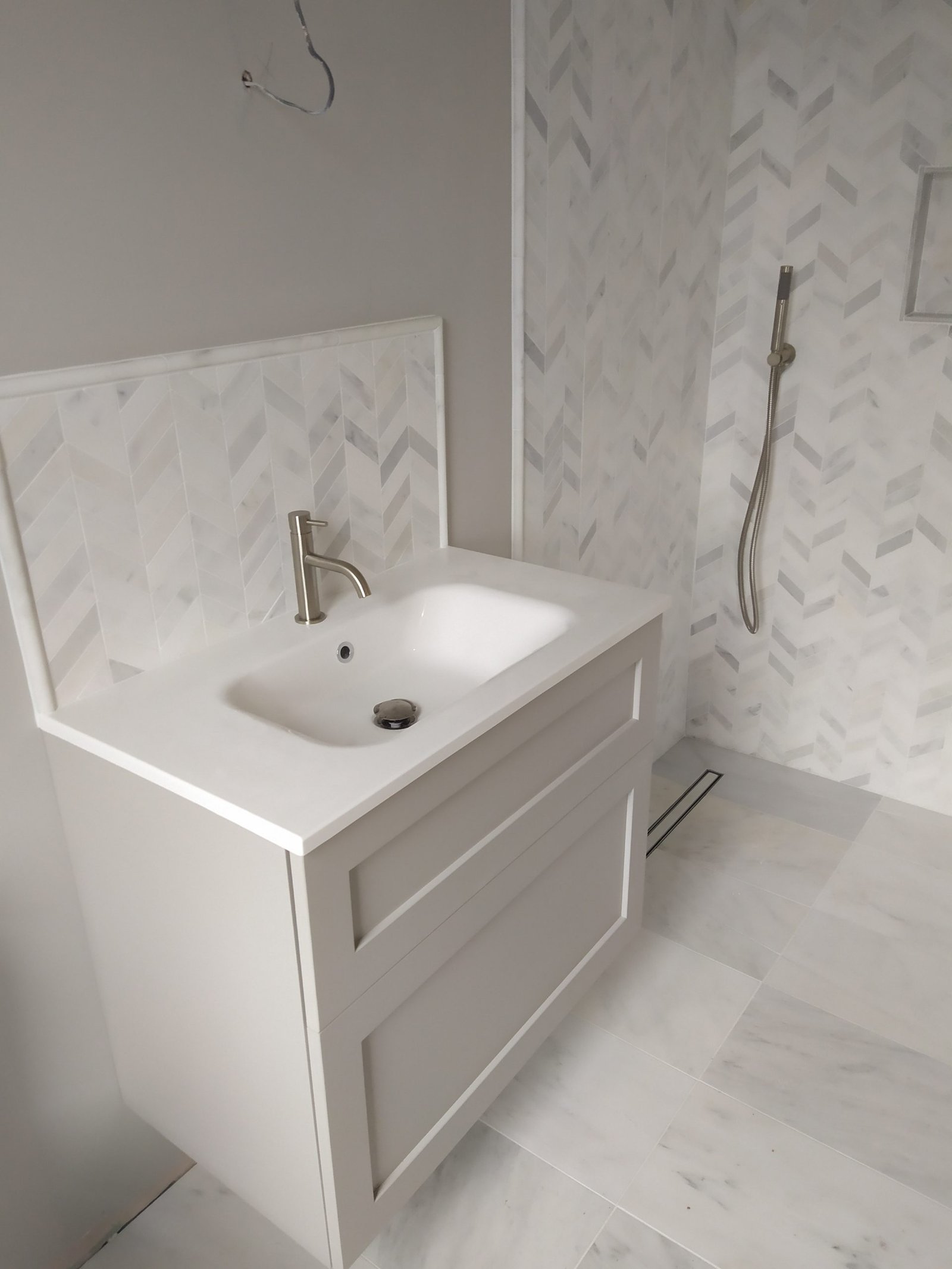 Bathroom sink and tap