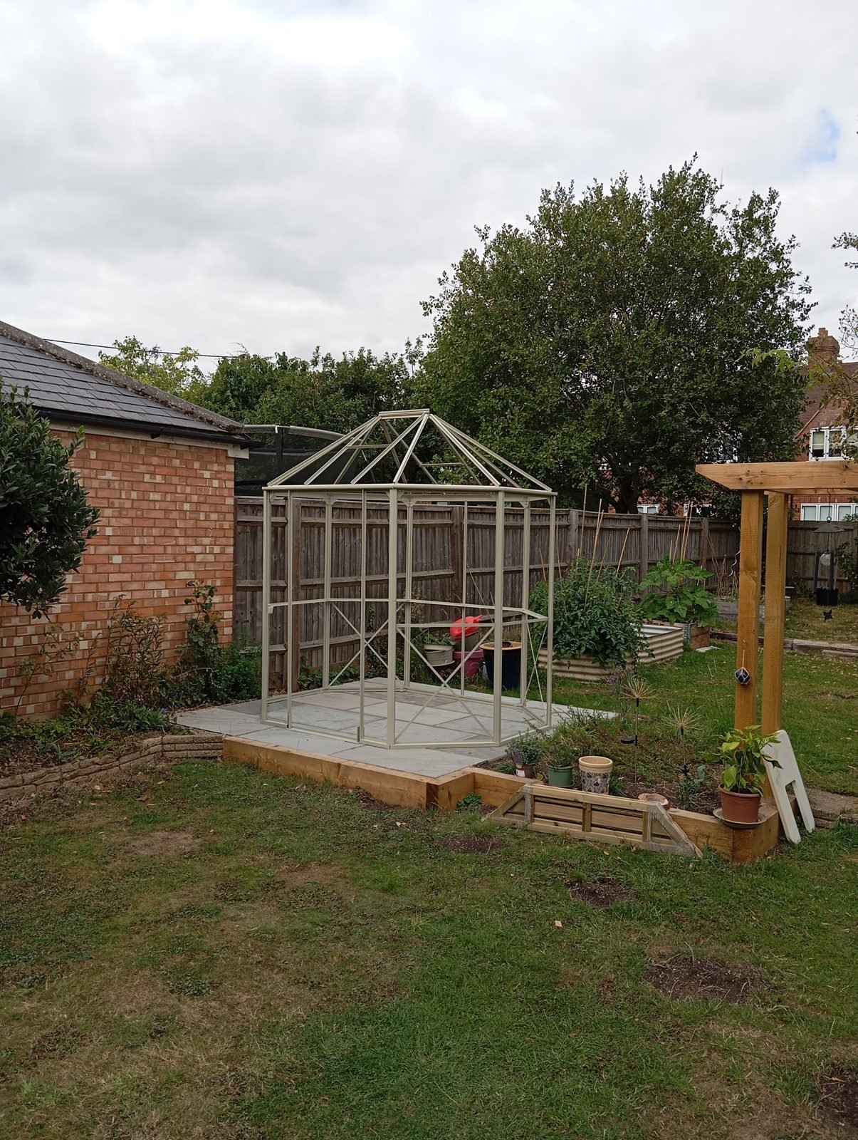 Greenhouse frame with roof bars in place